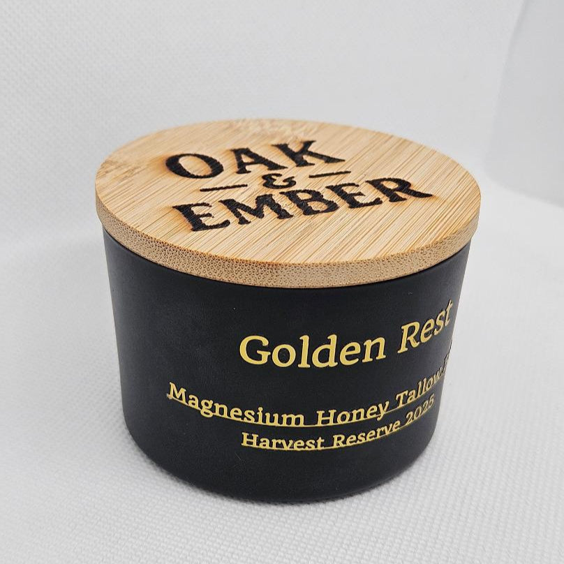 Black container with wooden lid labeled 'Oak & Ember' on a white background