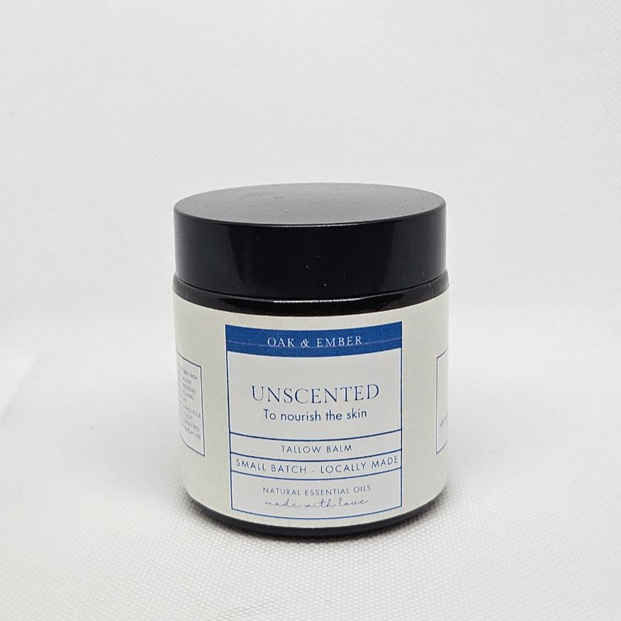 Jar of unscented skin nourishing balm on a white background
